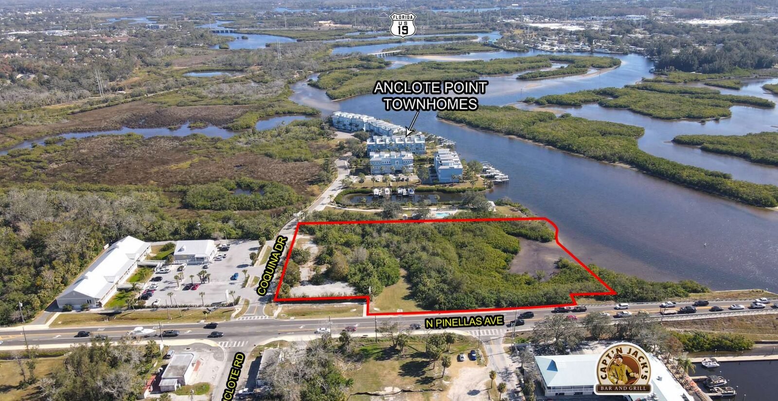 River-access corner site for mixed use