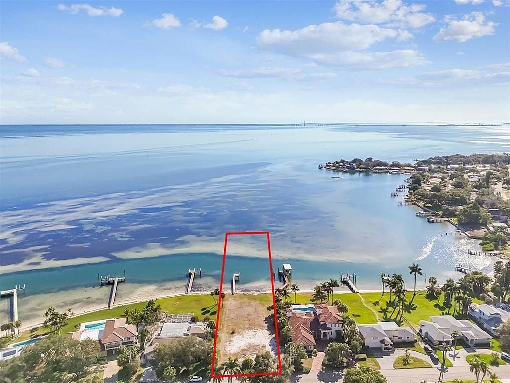 Waterfront estate lot with construction plans