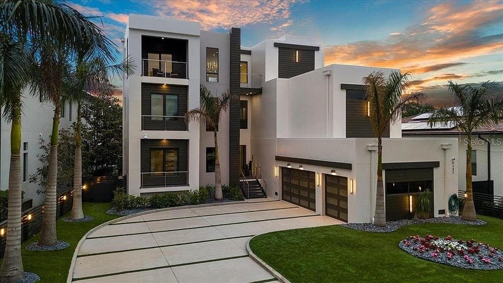 Modern waterfront villa with theater and spa